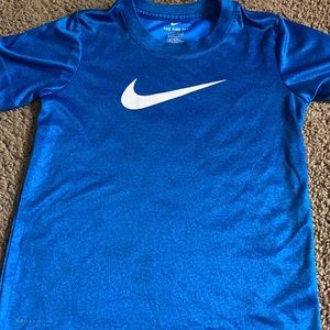 Nike Dri-fit shirt for ages 6-7. Blue